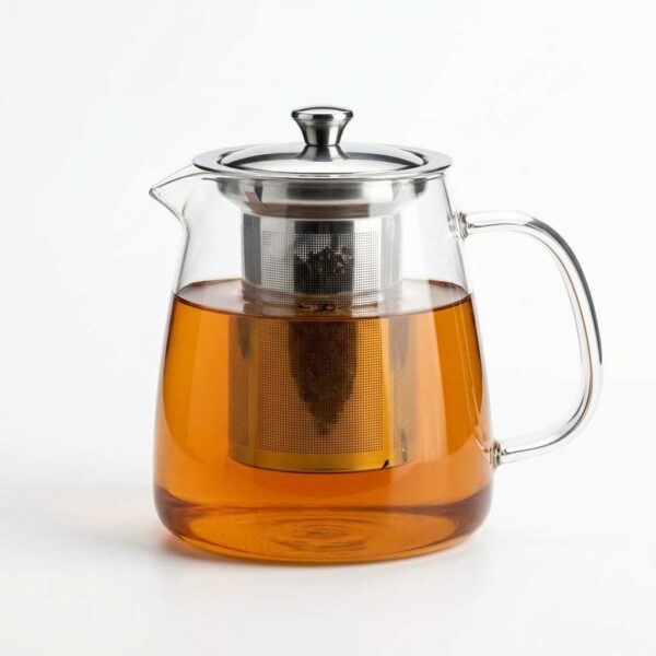 Transparent glass tea jug with steel infuser on white background